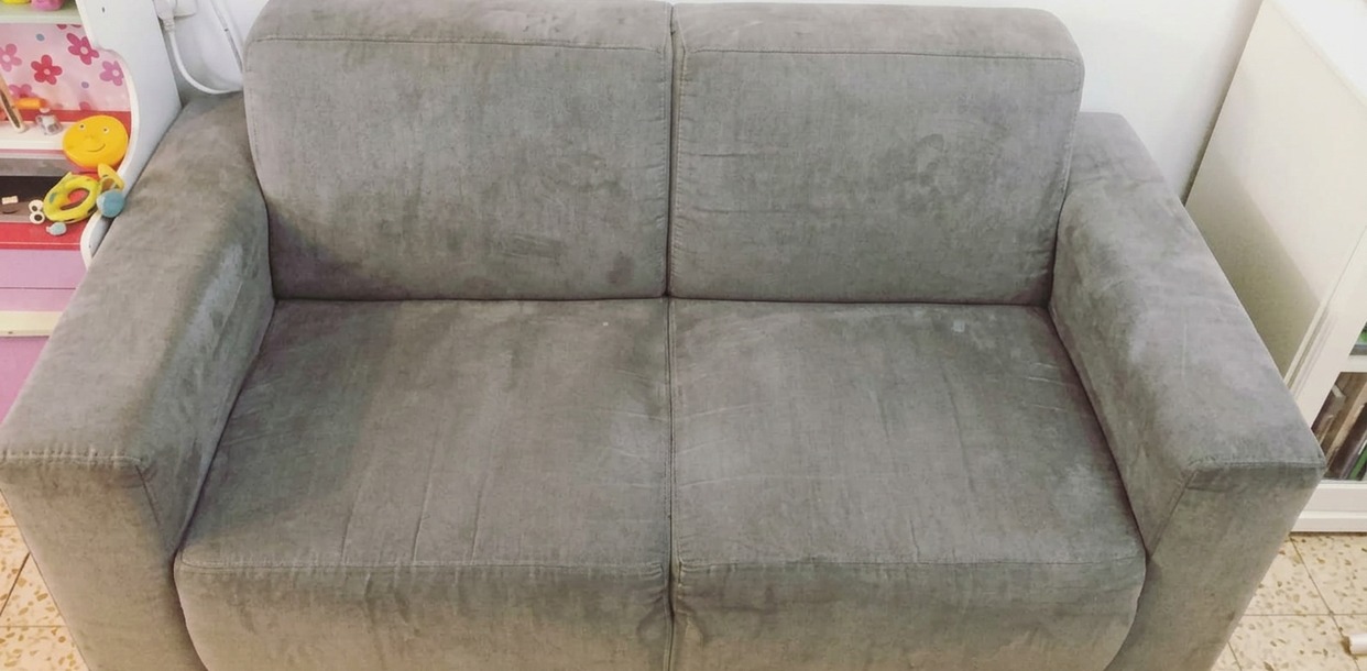 The same fabric sofa after professional upholstery cleaning