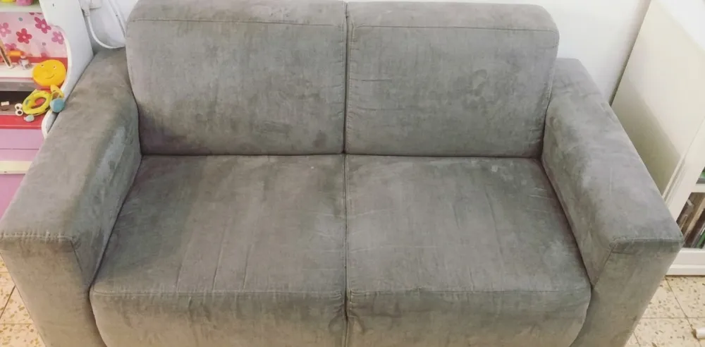 The same fabric sofa after professional upholstery cleaning