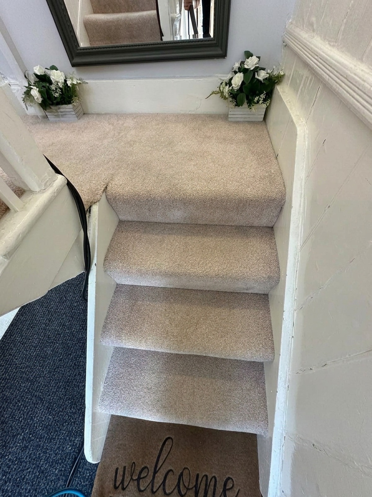 The same stair carpet after professional deep cleaning
